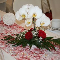 Inselhof Vineta Hochzeit Orchideen als Dekoration auf dem Hochzeitstisch